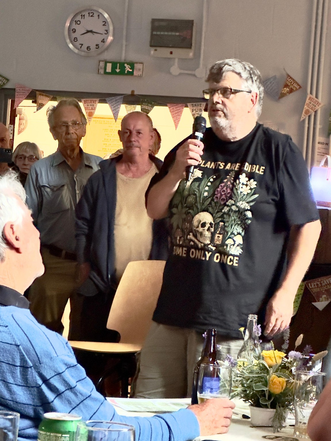 Mark Haslam speaking at the Village Hall meeting