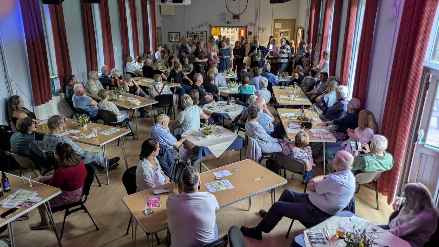 A packed Village Hall meeting about The Farmers Arms